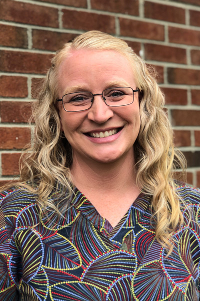 Headshot of School Director Andi Koscierzynski