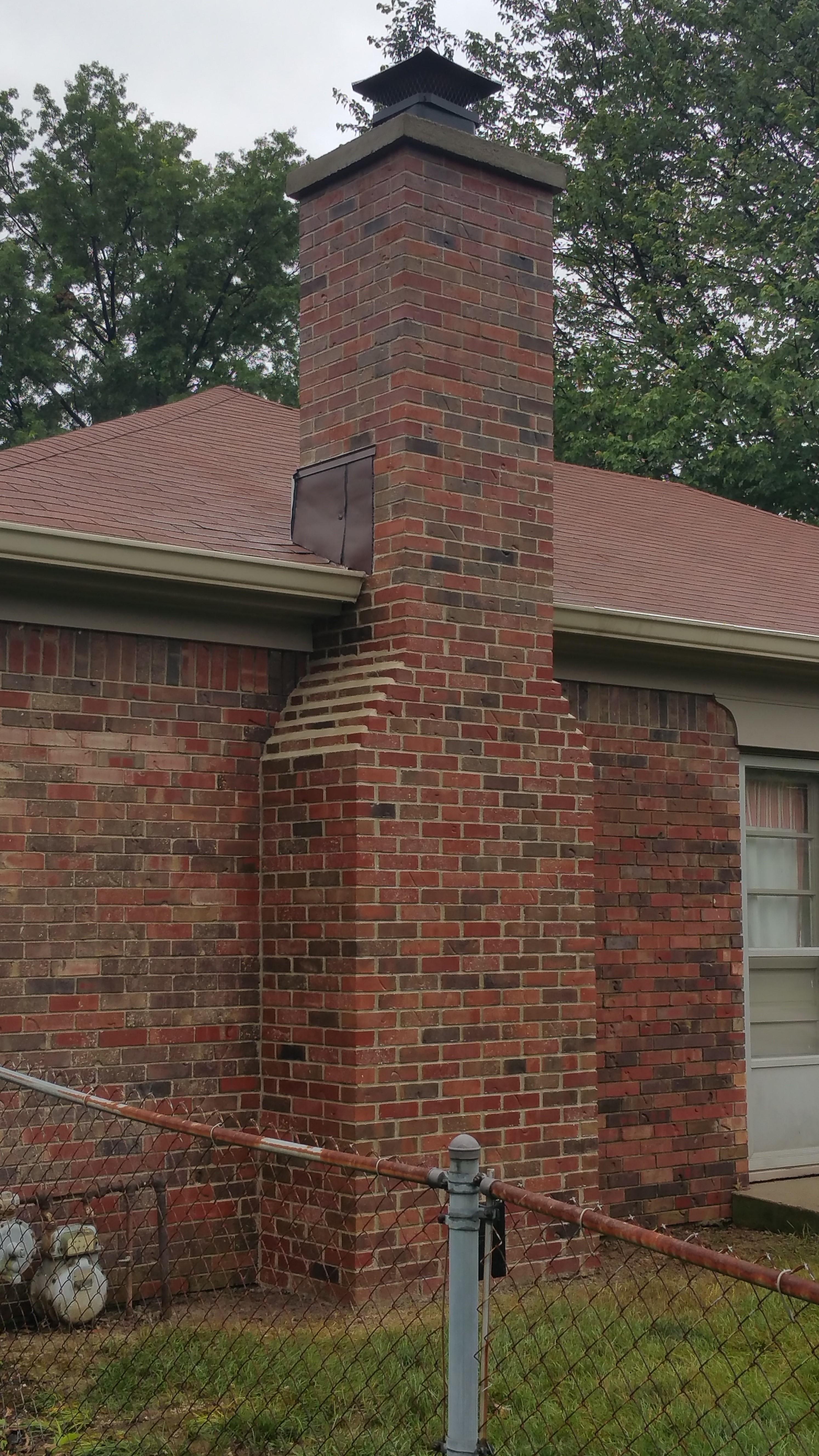 This chimney had so much damage it was not able to be saved. We took down the old chimney and hauled it away. This is a picture of the one we put in it's place. almost perfect brick and mortar match. THe home is 40 years old.
