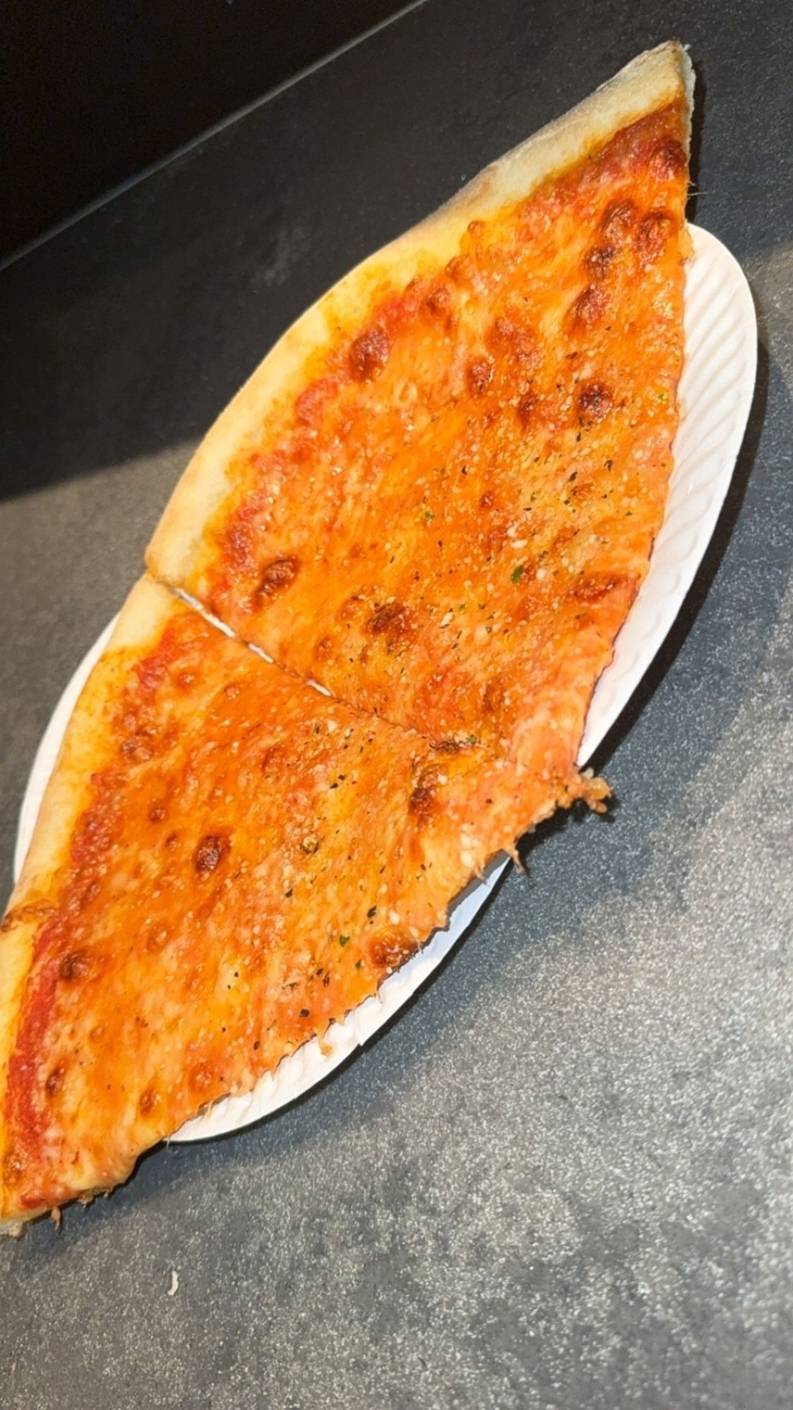 Jumbo Cheese pizza slice