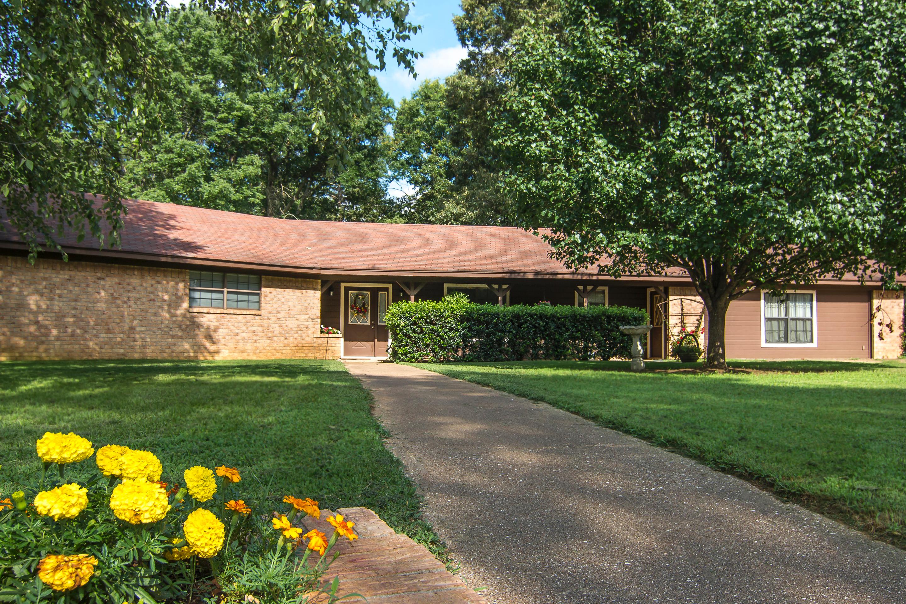 You absolutely will not run out of space with this spacious home in White Oak. An impressive entrance into the home with hand scraped wood floors throughout  & a view of the huge living room with vaulted ceiling. Huge breakfast area to accommodate a large family just off kitchen. Bonus room currently being used as a game room but can easily be a mother-in-law suite. Large master bedroom with his & her closets. Nice covered patio & back yard large enough for a pool and kids to play.