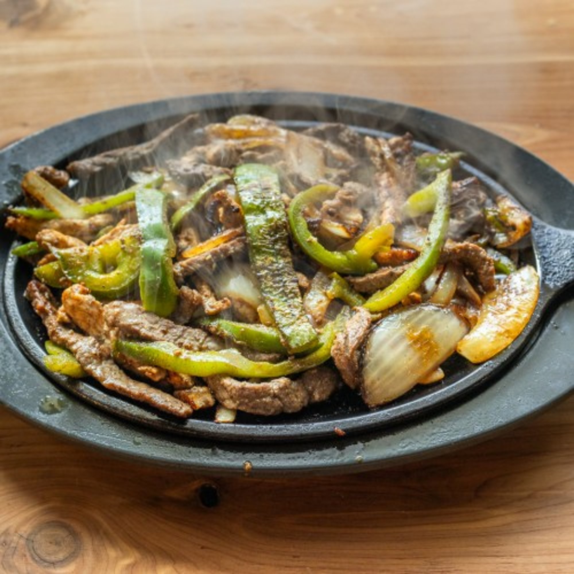 Fajitas (Steak, Chicken, or Combo)
