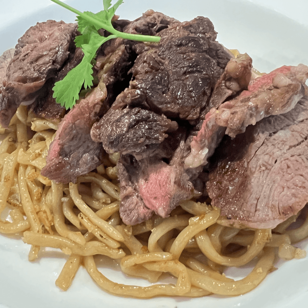 Ribeye Steak Over Garlic Chowmein Noodles