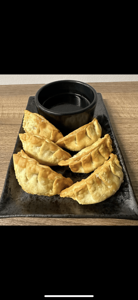 A 7/ Chicken Potstickers