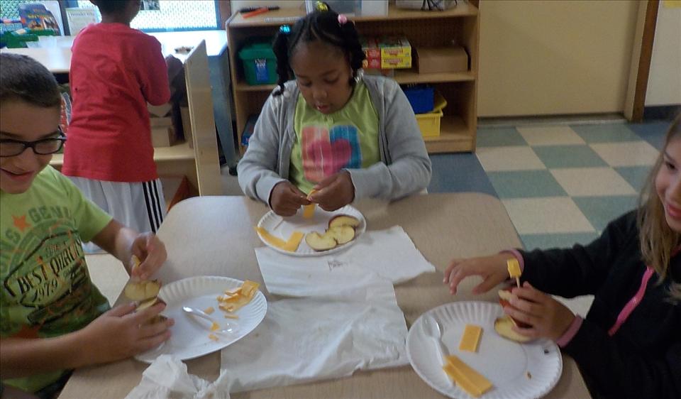 School Agers make a sailboat using various foods