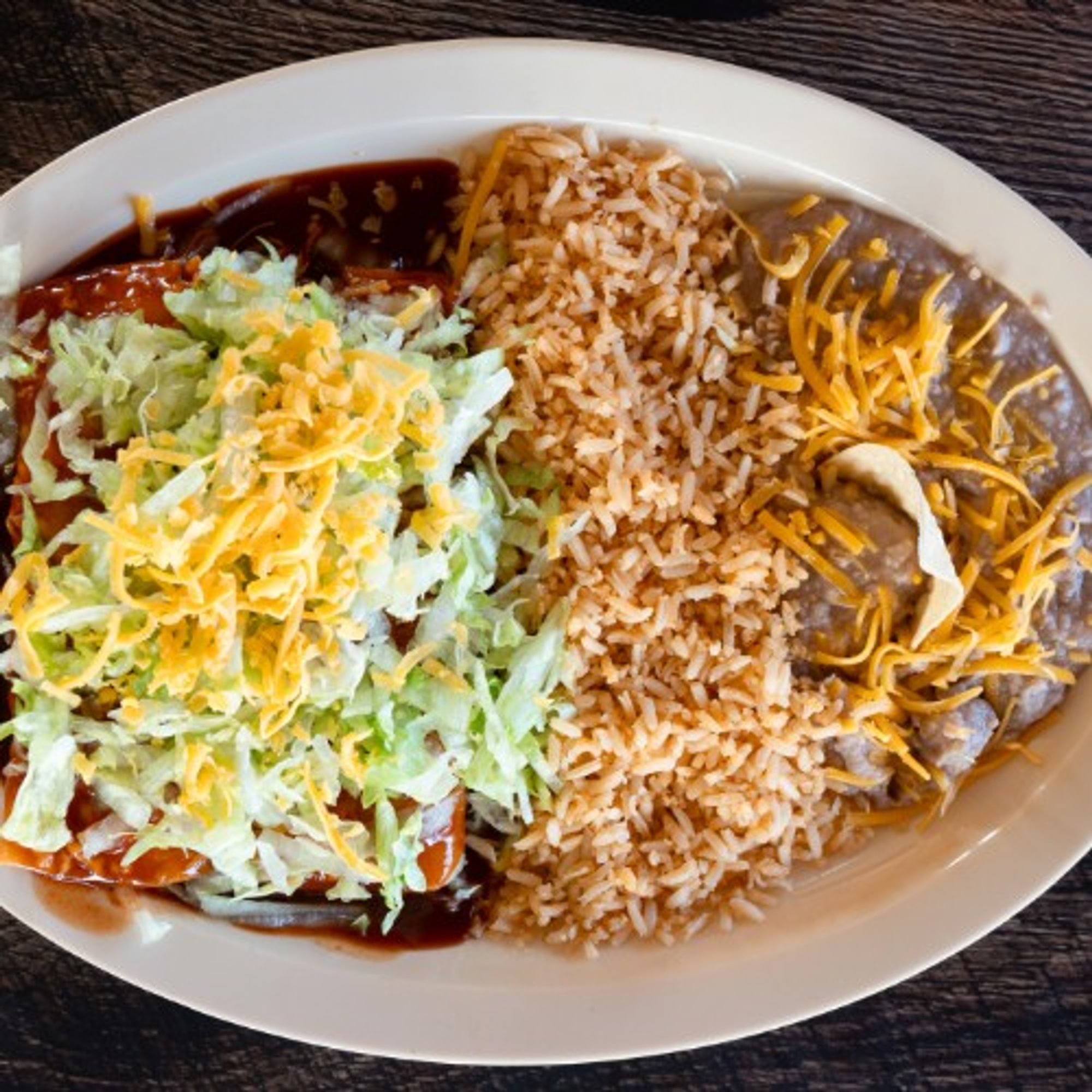 Two Enchiladas W/ Soda & Side