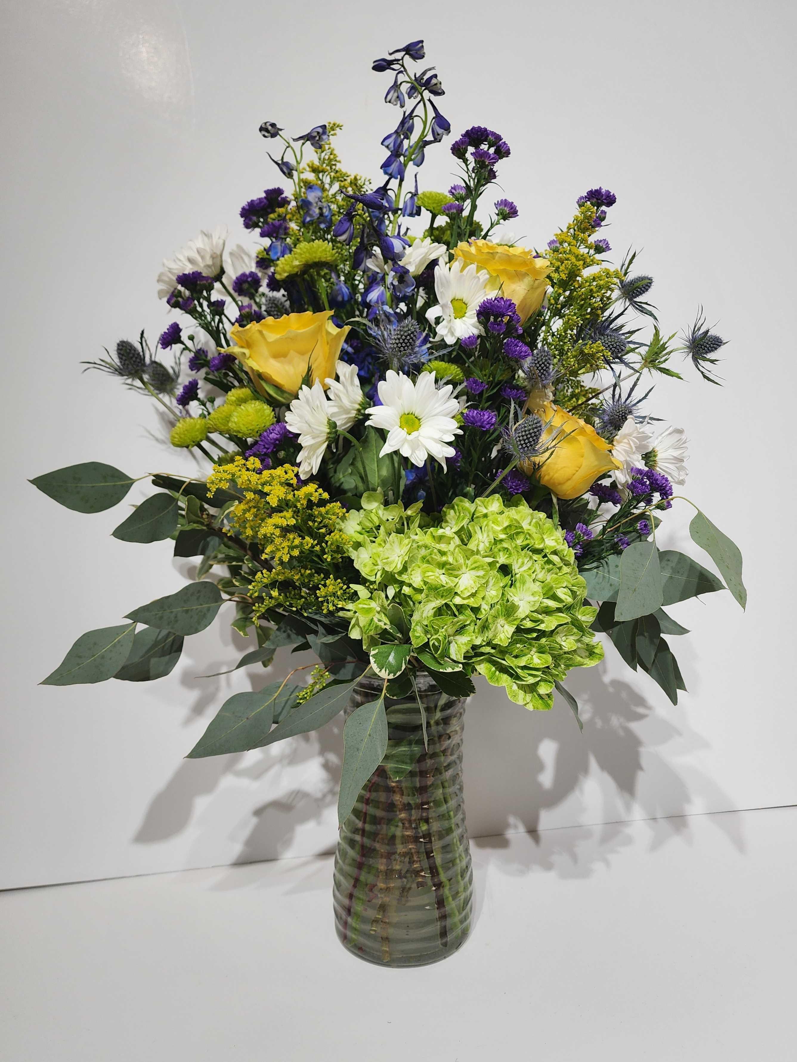 yellow rose and green hydrangea arrangement by Country Greenery at The Galleria