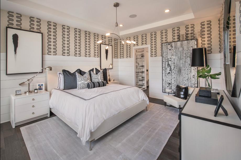 Luxurious first-floor primary bedroom suites