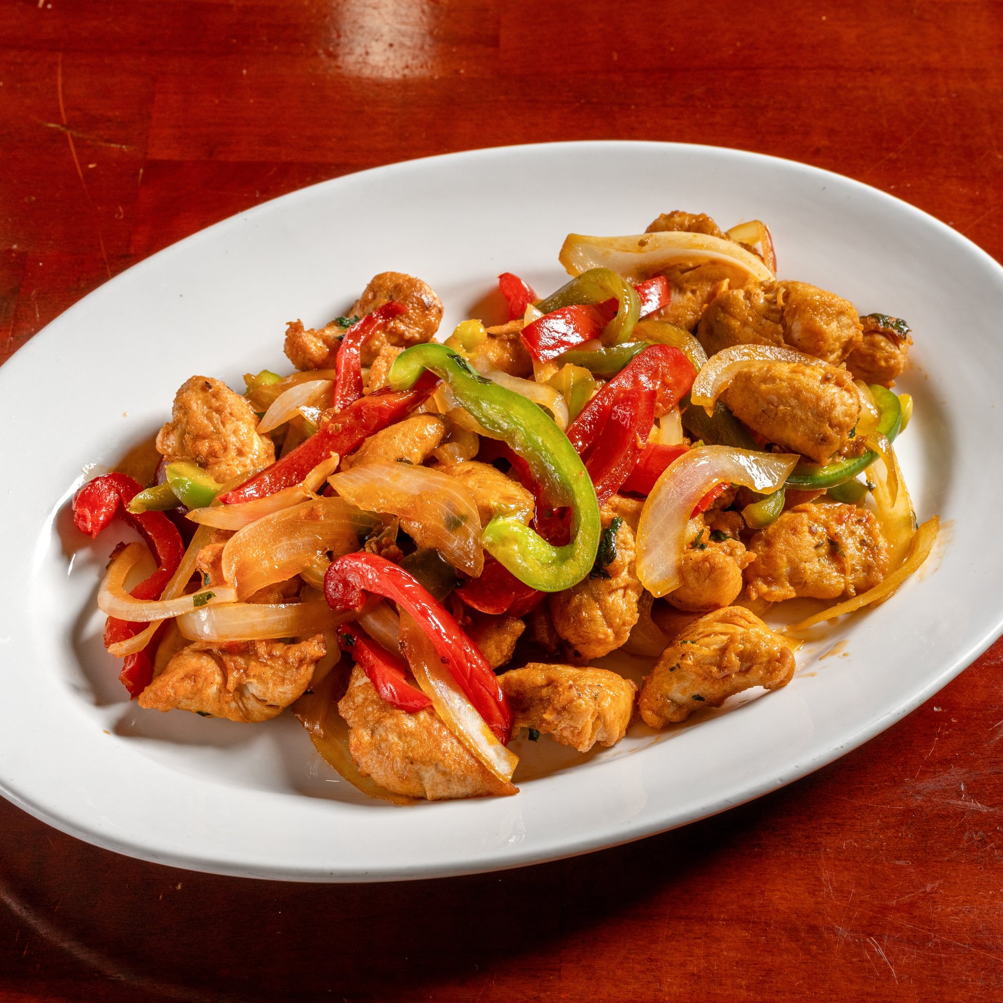 Pollo Salteado (Chicken with Peppers & Onions)