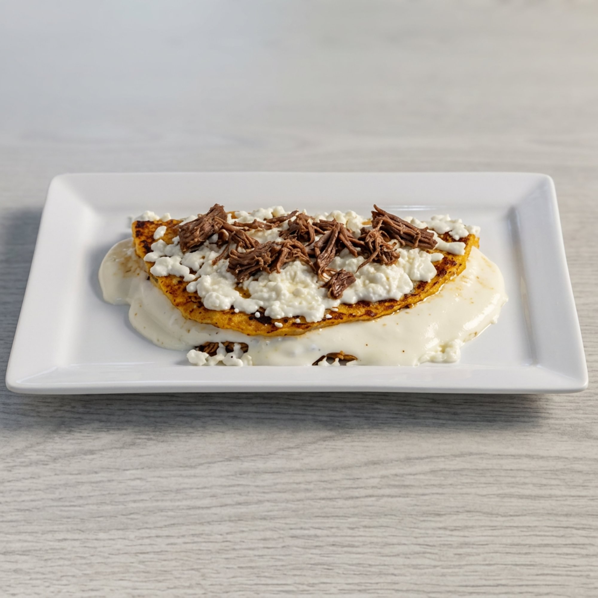 Cachapa de Carne (Shredded Beef Corn Pancake)
