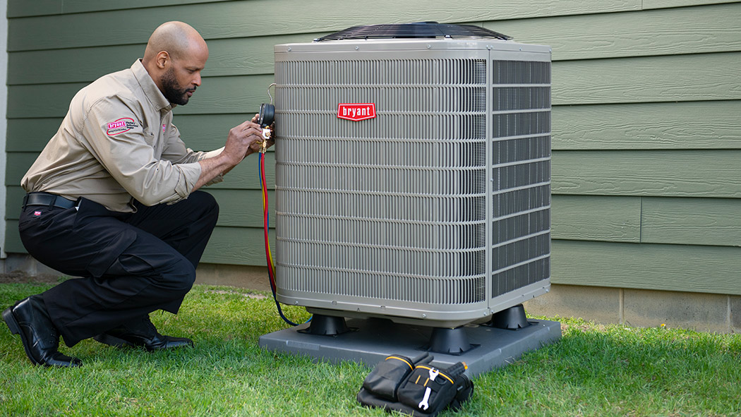 a bryant dealer performs air conditioner repair and service