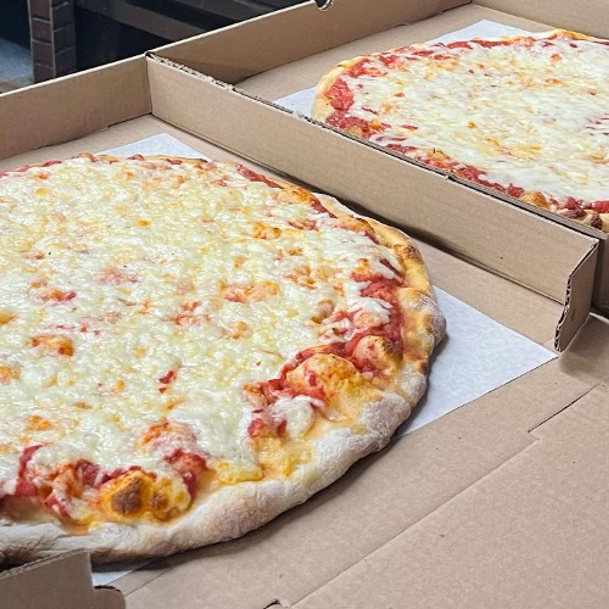 2 Large Pizzas & 12 Wings Special