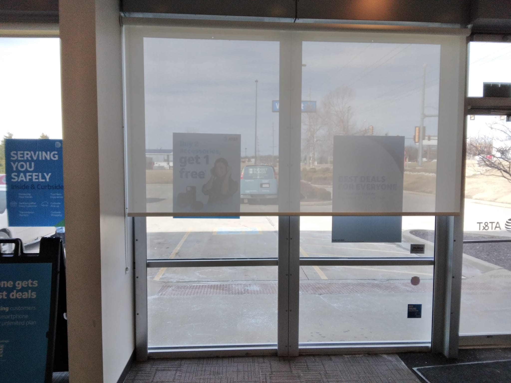 Roller shades are one of the best window covering options for commercial applications. They look great in this store front in Jacksonville, Illinois.  BudgetBlinds  WindowCoverings  Shades  RollerShades  SpringfieldIllinois  Springfield
