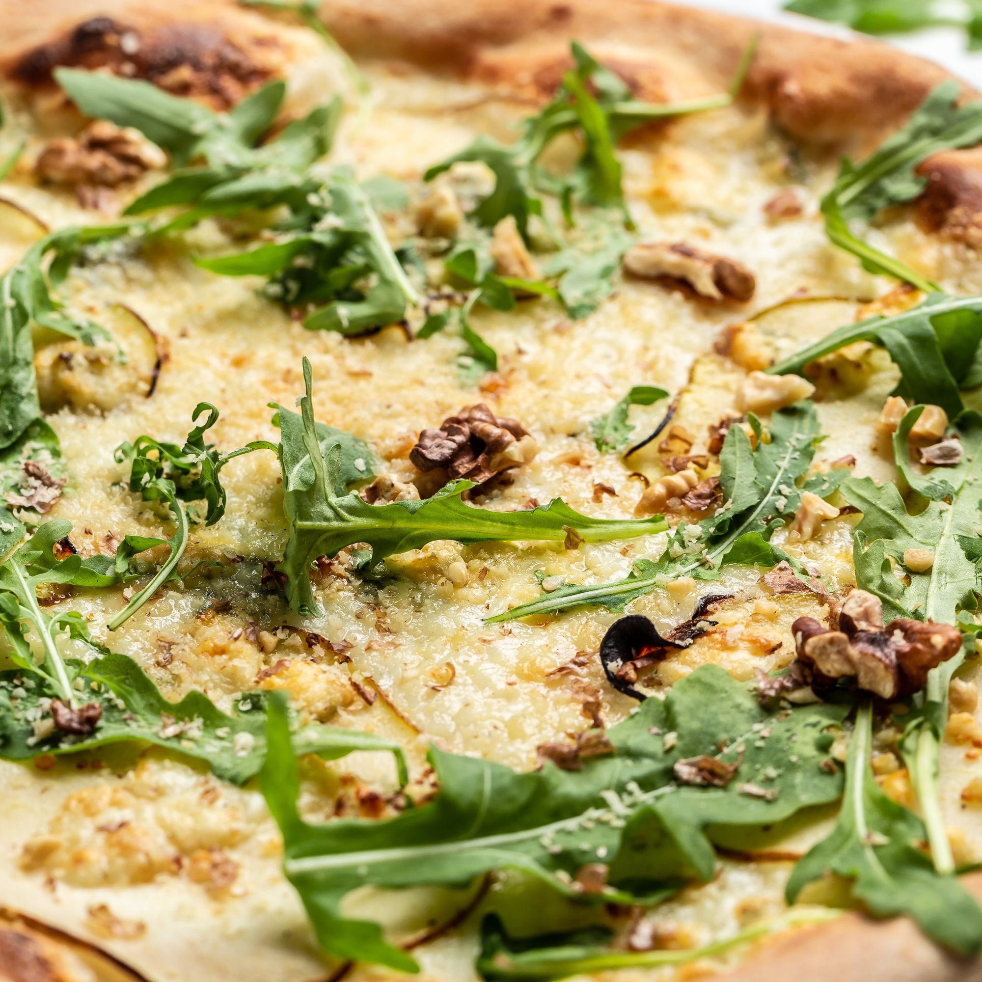 Arugula pizza slice