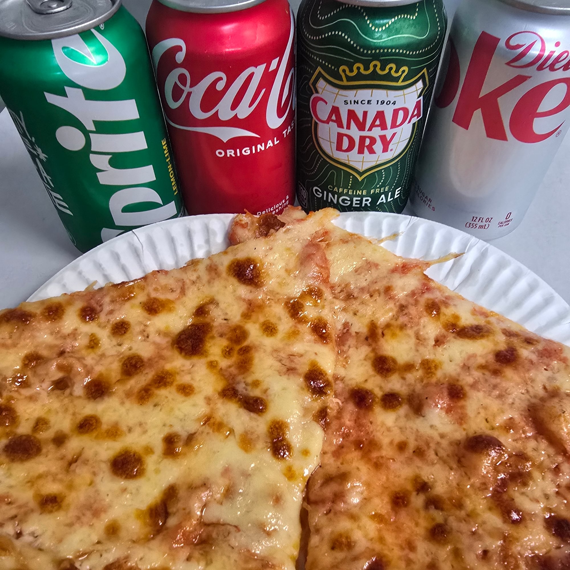 2 Slices of Cheese and a Can of Soda