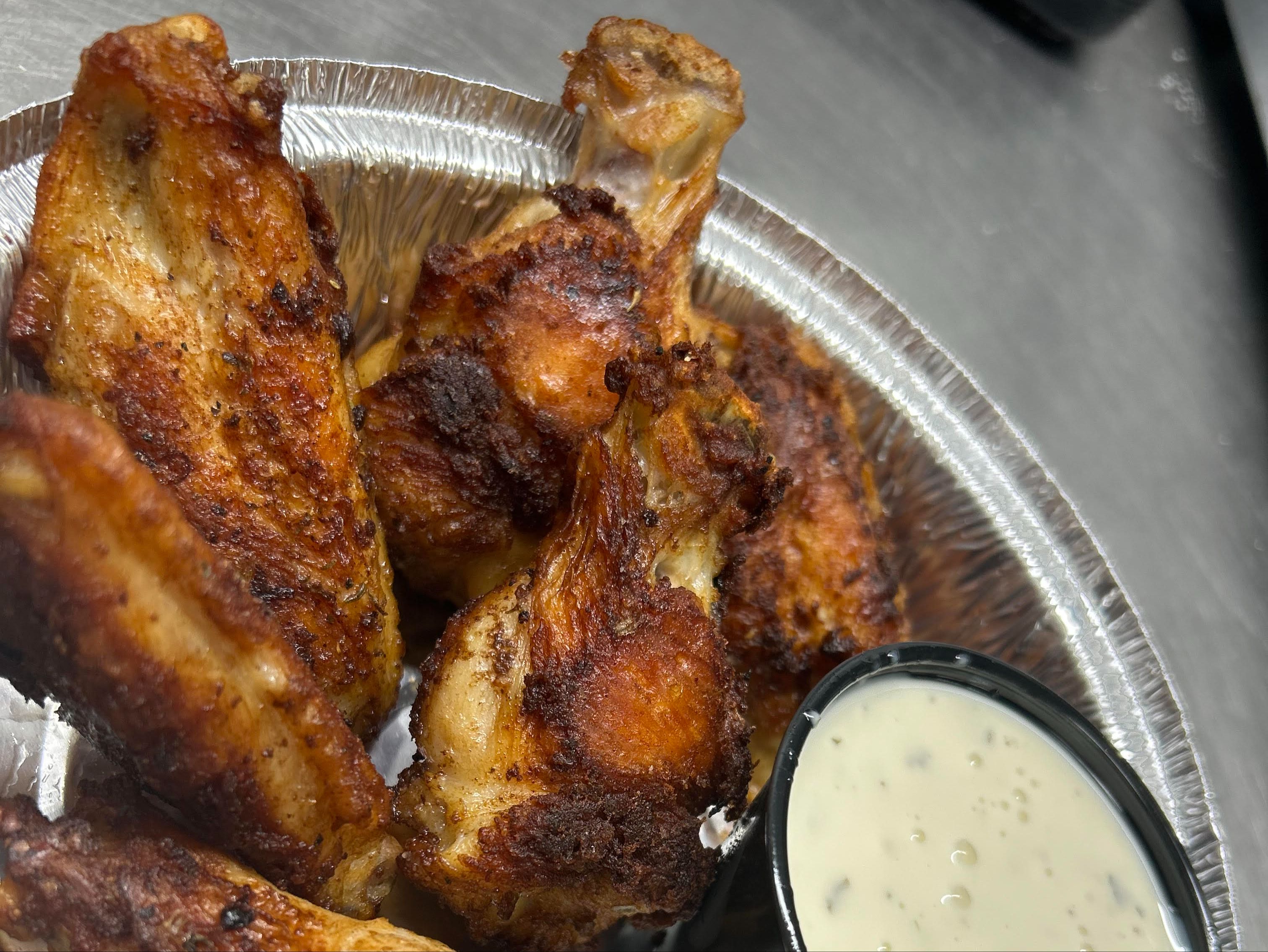 6 Bone in wings (Sauce on side sold separately)