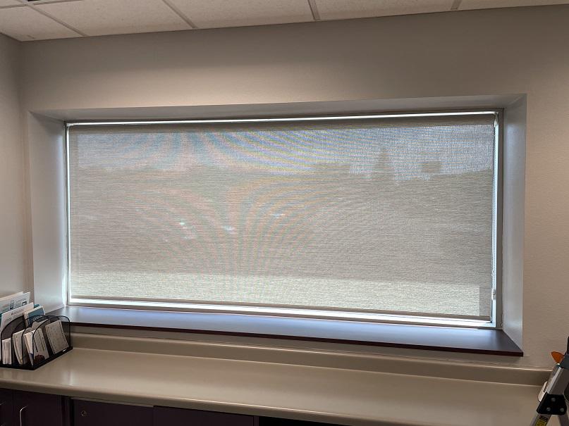 It's a lot easier to work in this Westonka office space now! That's because our Solar Shades are working hard to keep the glare off the desk. Plus, they're just sheer enough that you can see what's happening outside!