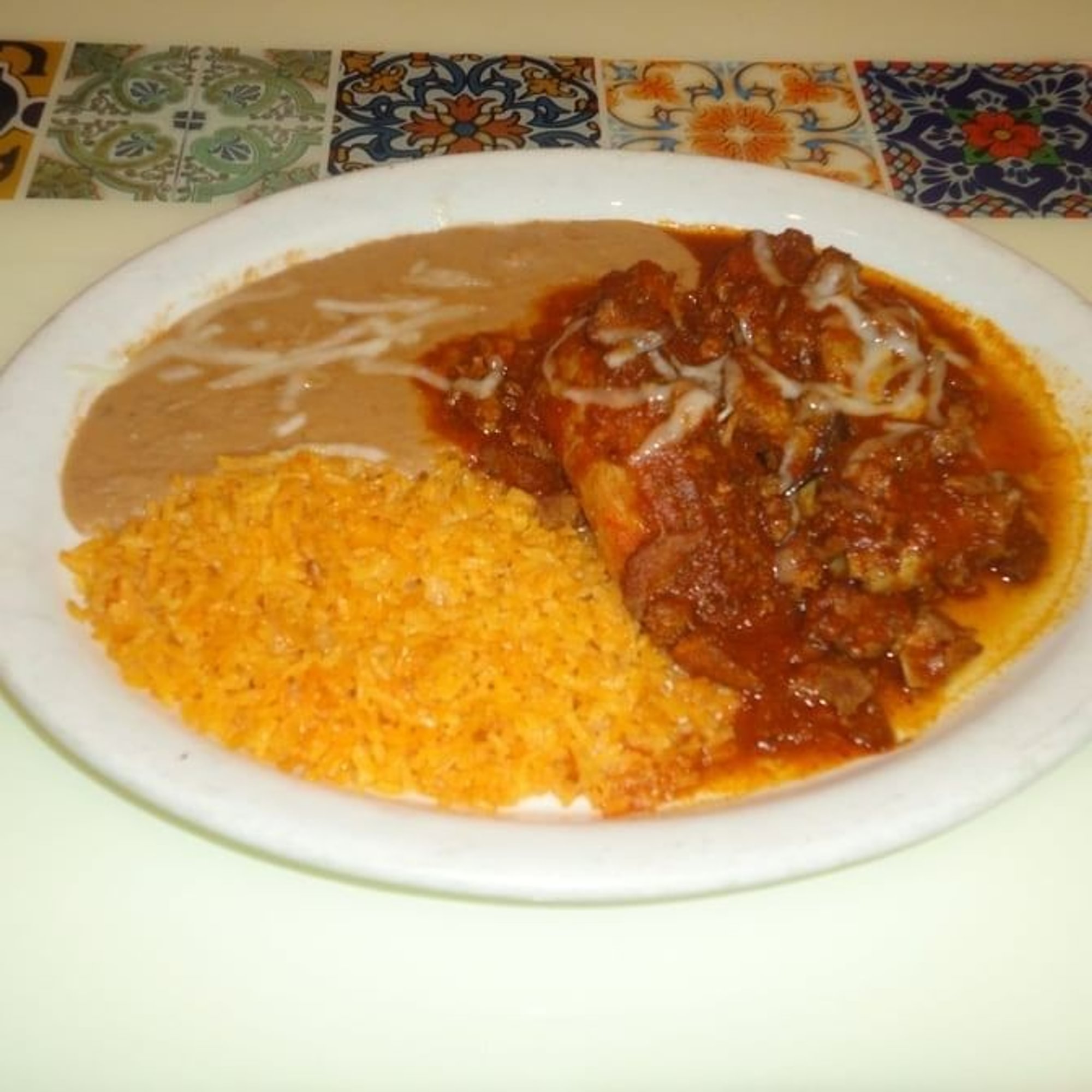 I. Two Tamales with Chile Con Carne Combo Plate