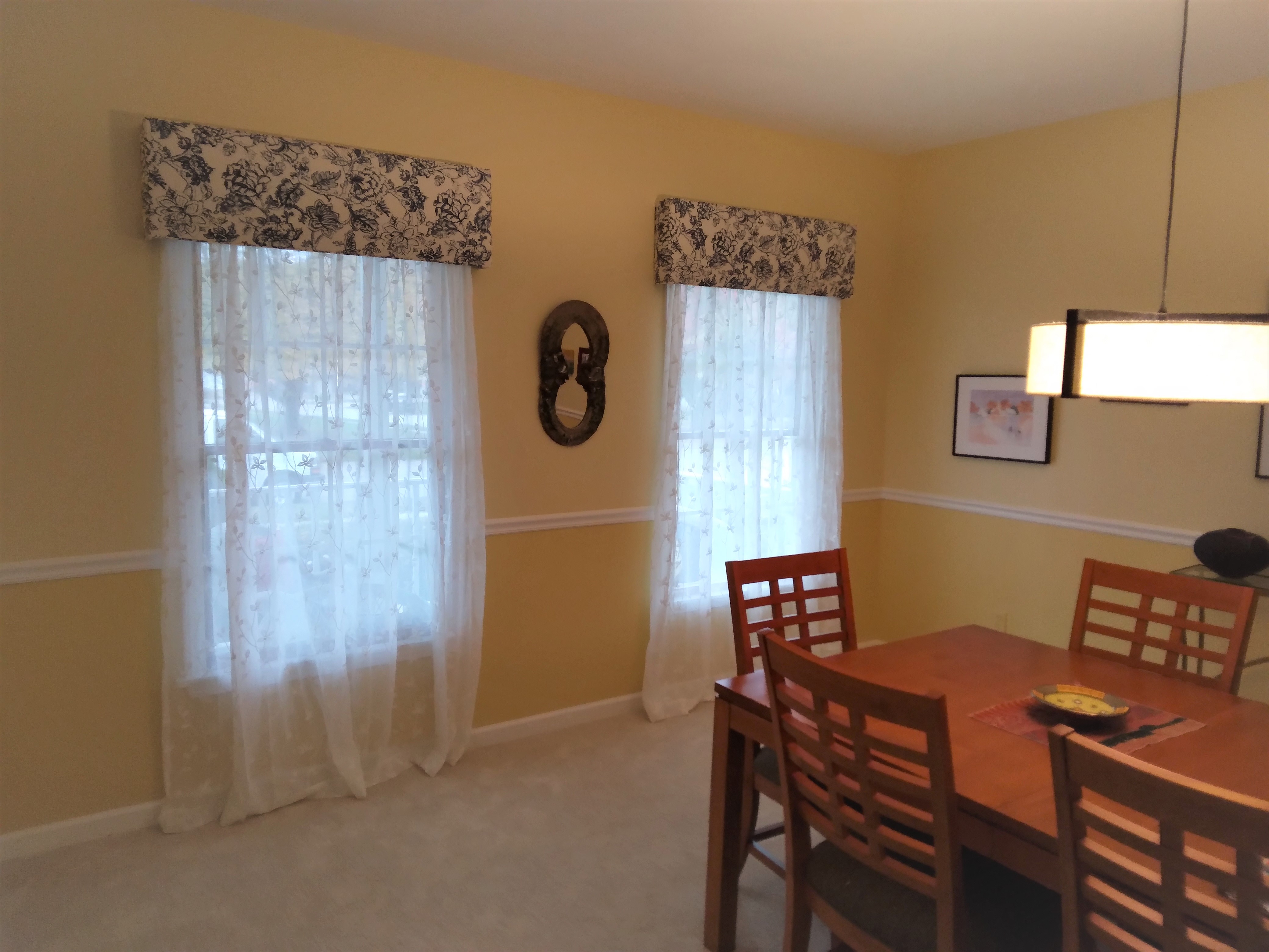 Cornices with sheer drapery in Springfield Illinois dining room.  BudgetBlinds  WindowCoverings  Cornices  SpringfieldIllinois
