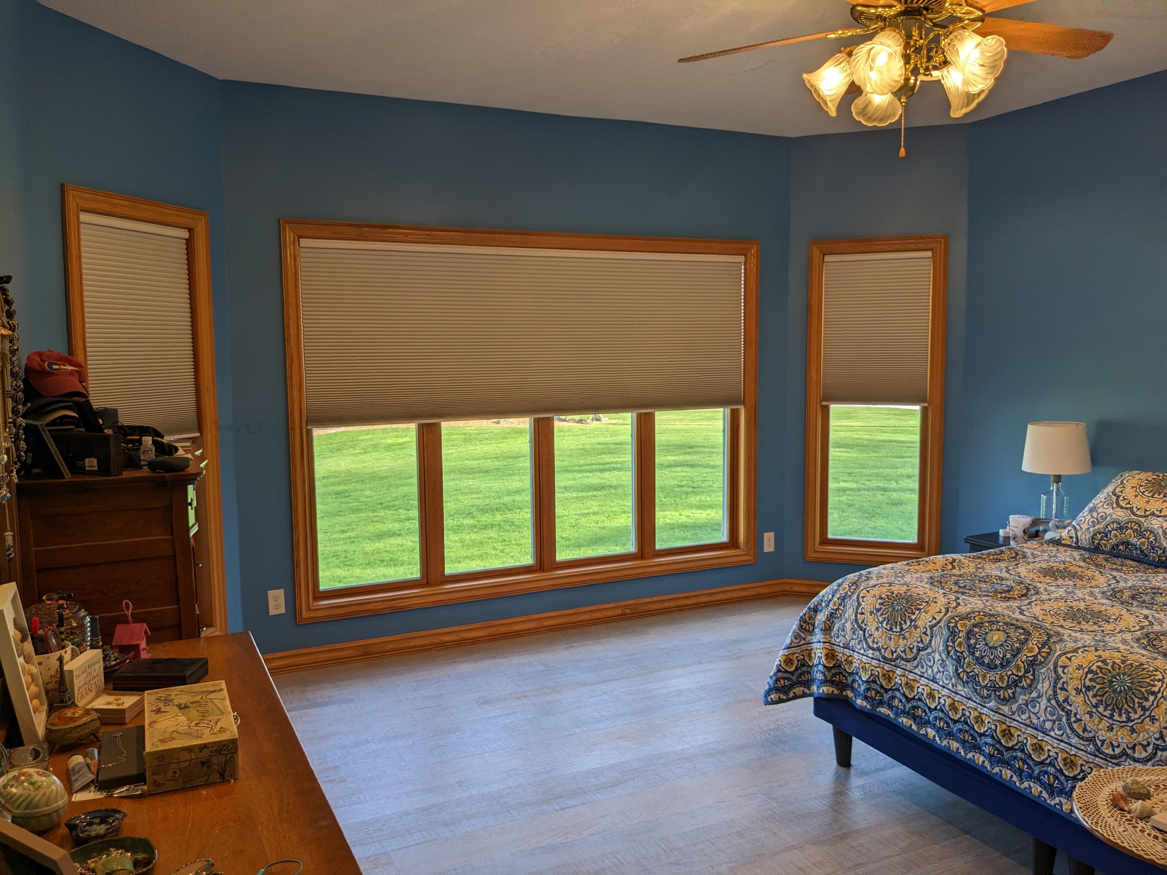 Cordless room darkening cellular shades in Springfield Illinois bedroom.  BudgetBlinds  WindowCoverings  Shades  CellularShades