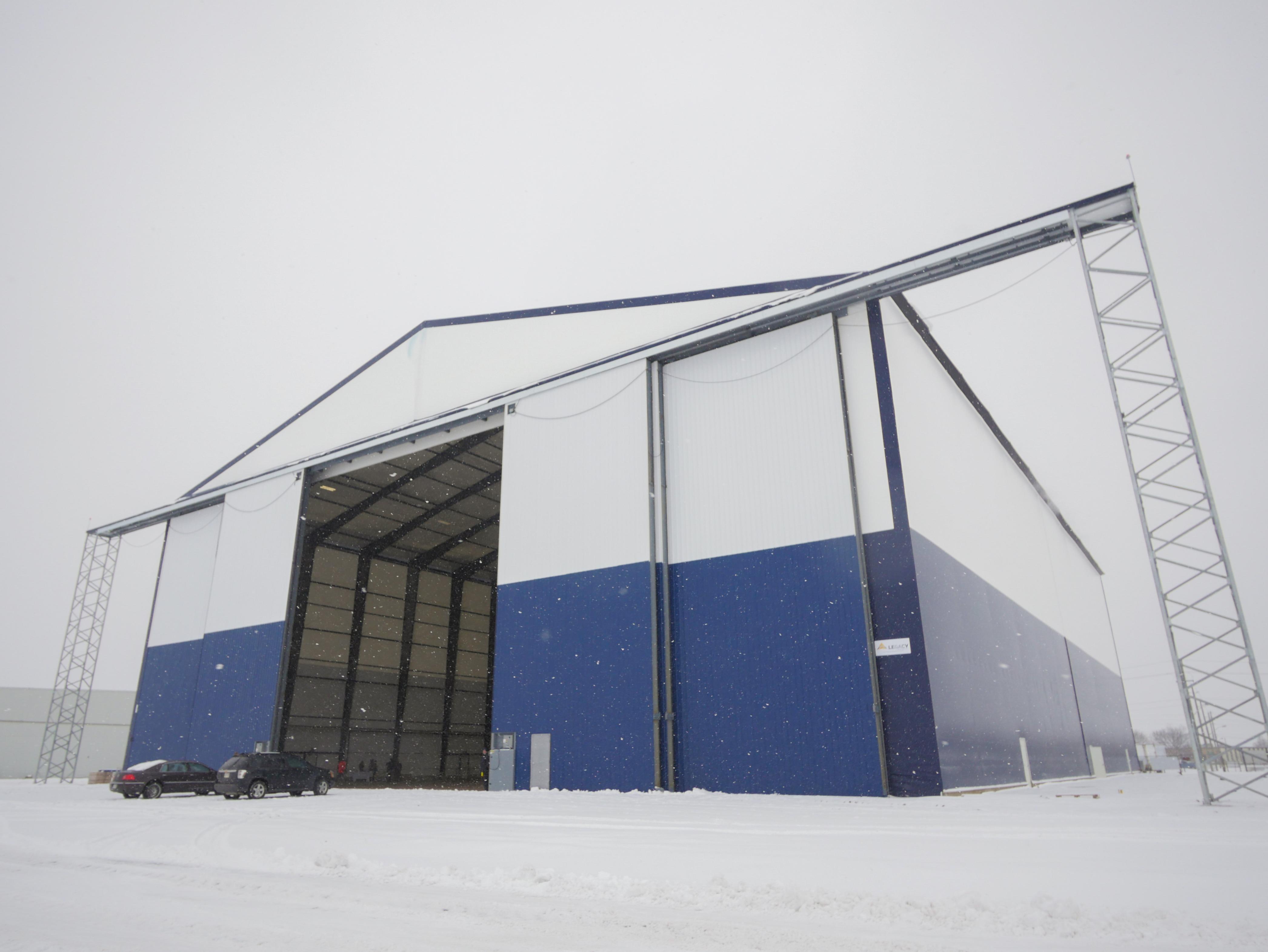 aircraft assembly hangar, off-grid building, fabric structure