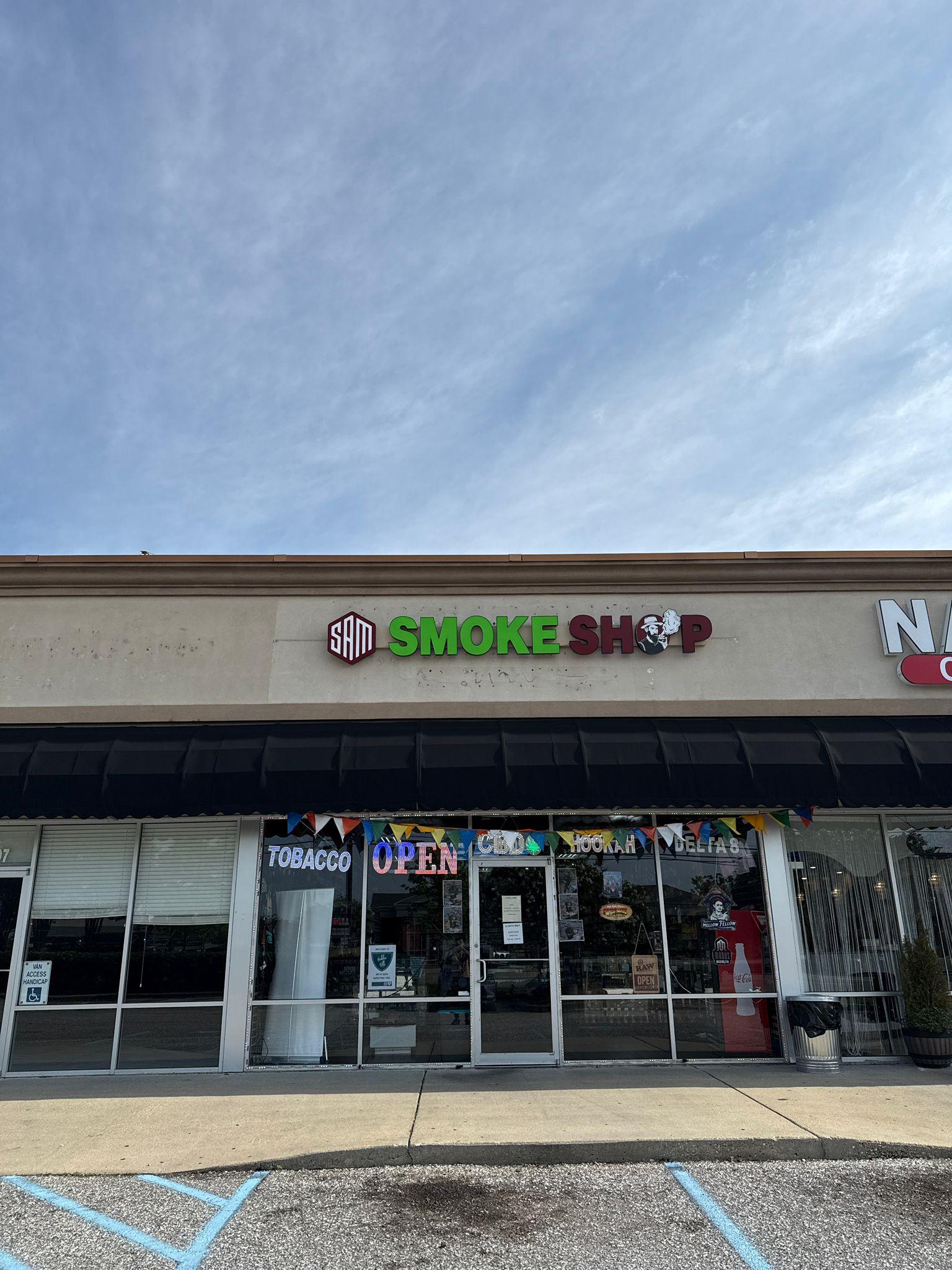 Sam Smoke Shop &amp; Vape Shop Logo