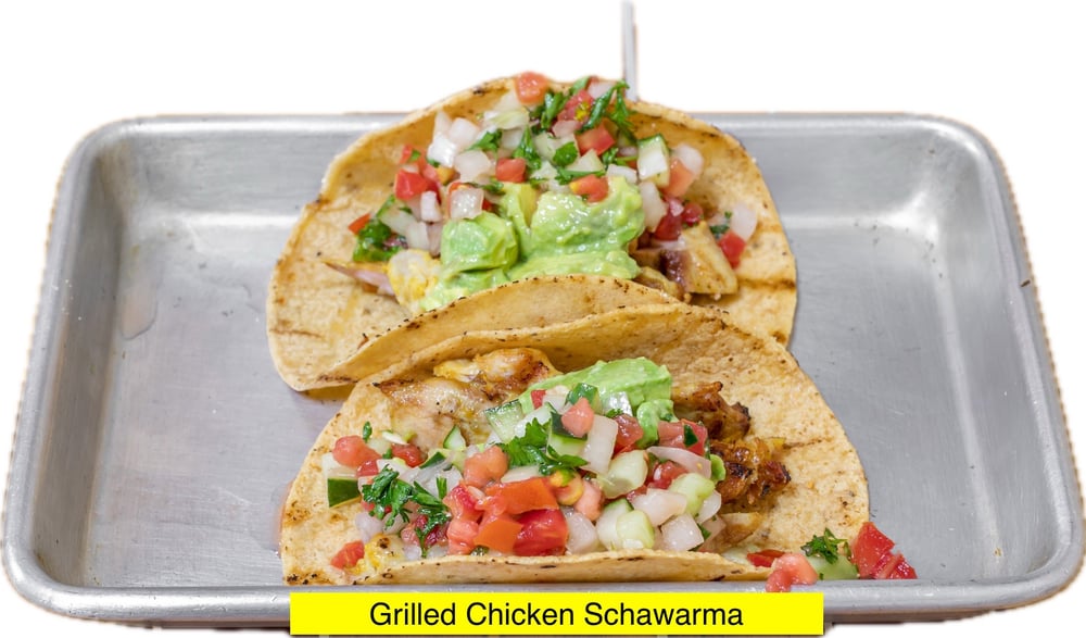 Grilled Chicken Shawarma Tacos, Avocado Hummus, Israeli Salad, Tahini