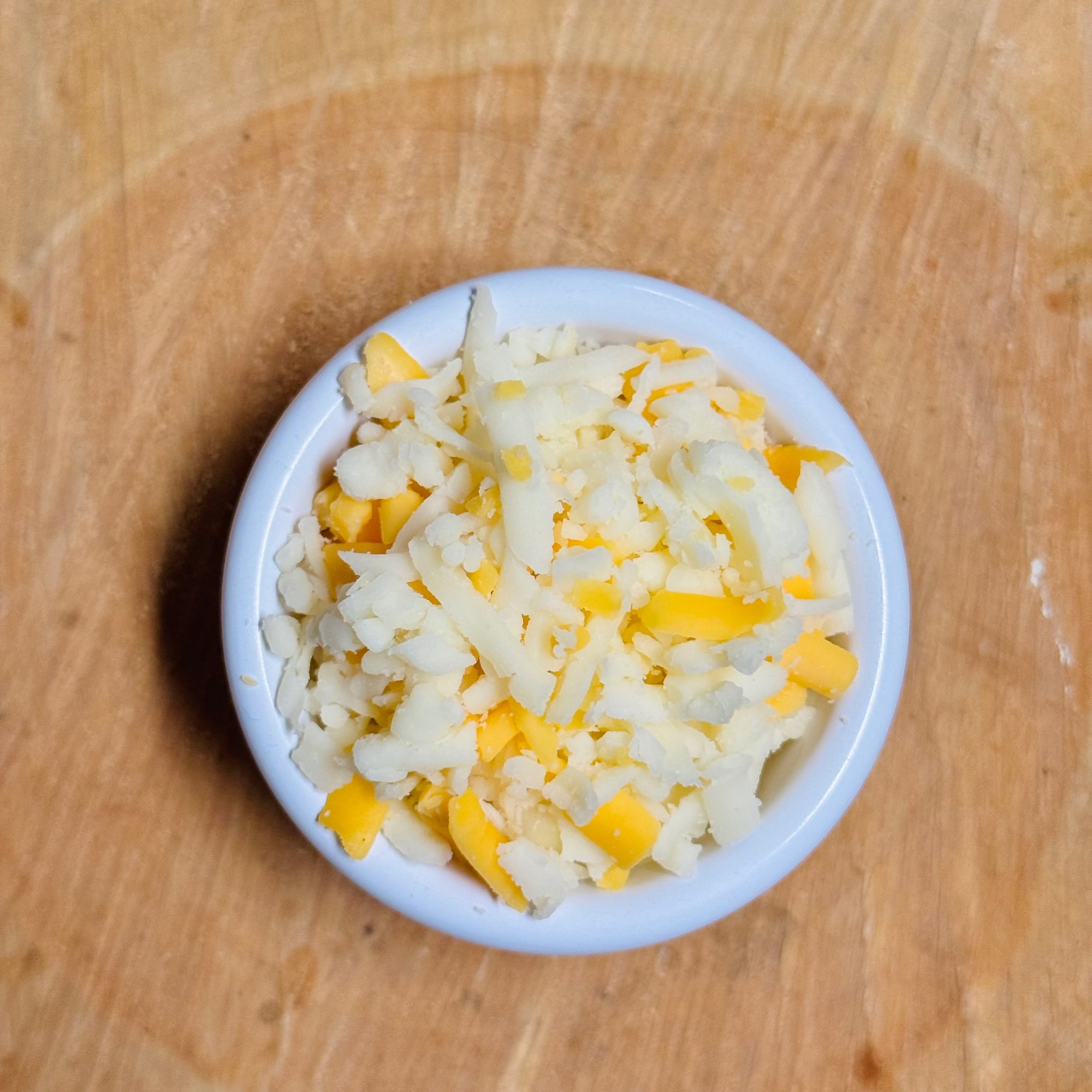 Side of shredded cheese