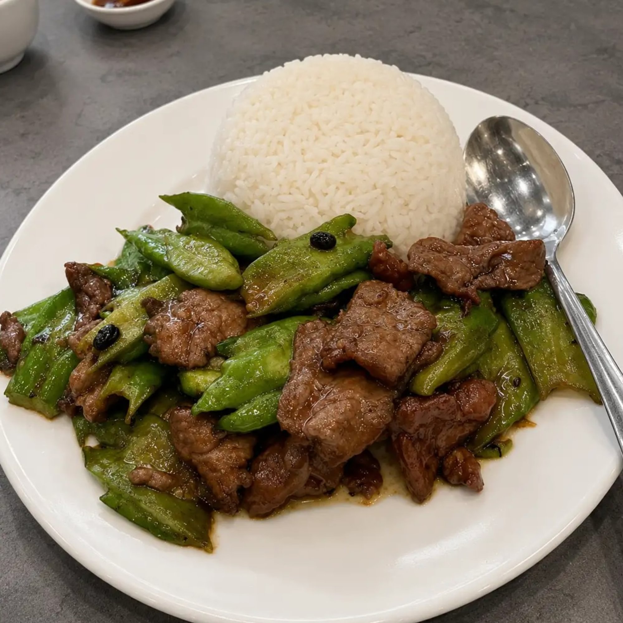 Stir-Fried Bitter Melon & Beef With Black Bean Sauce Over Rice