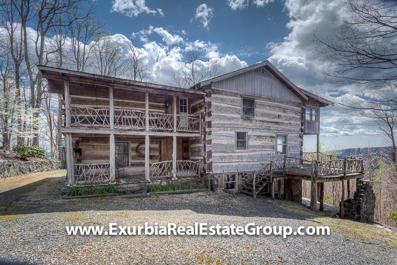 One of a kind log cabin built with timber cut directly from this property! 10 minutes to Blue Ridge Parkway & Huge Views of the Blue Ridge Parkway and surround mountains - Where Luxury Meets off the Grid  BlueRidgeMountains  BlueRidgeParkway  LittleSwitzerland  ExurbiaRealEstateGroup http://exurbiarealestategroup.com/idx/mls-191025-1198_holly_dale_drive_spruce_pine_nc_28777