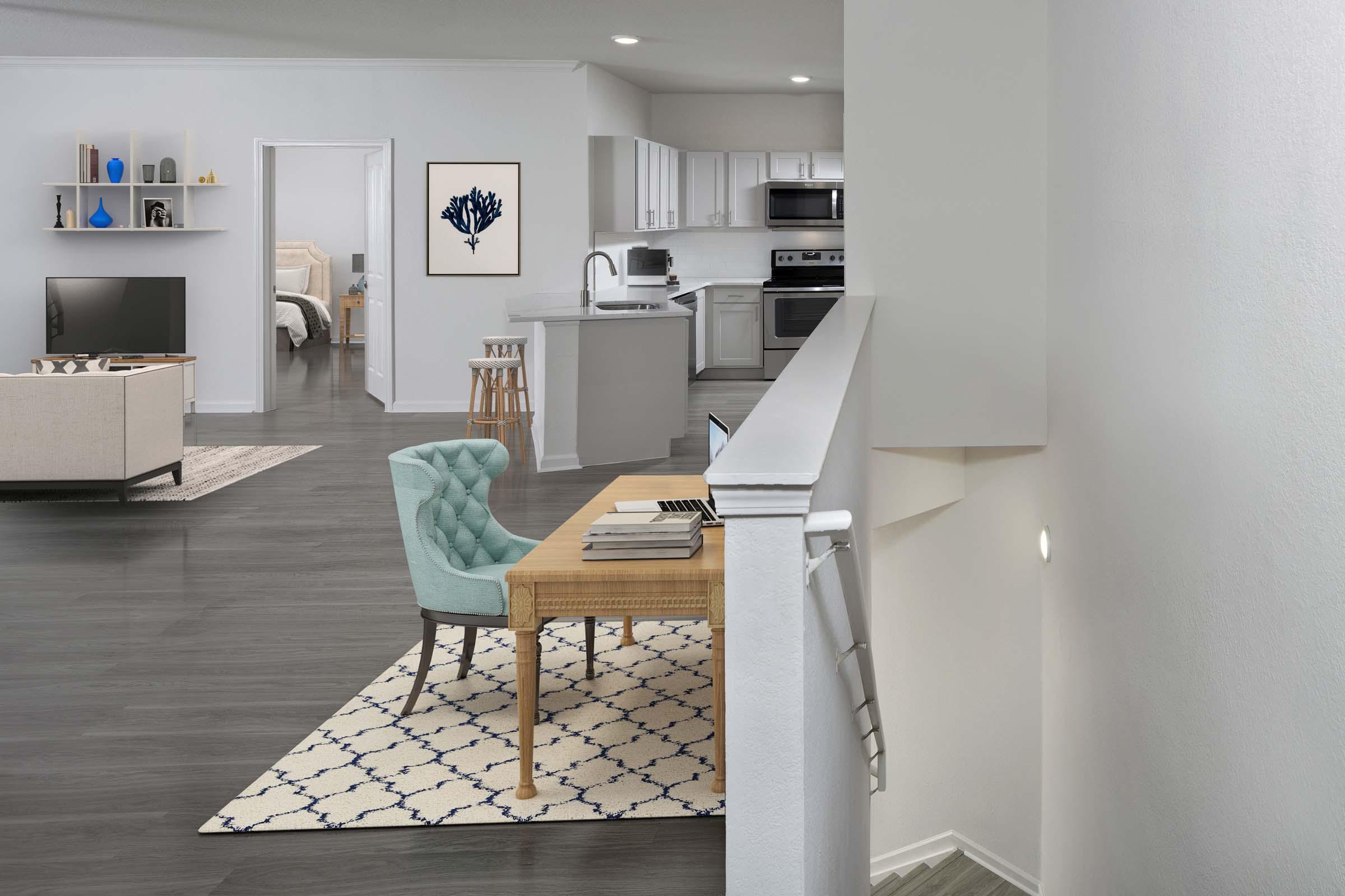 Large living room with wood inspired flooring and attached garage