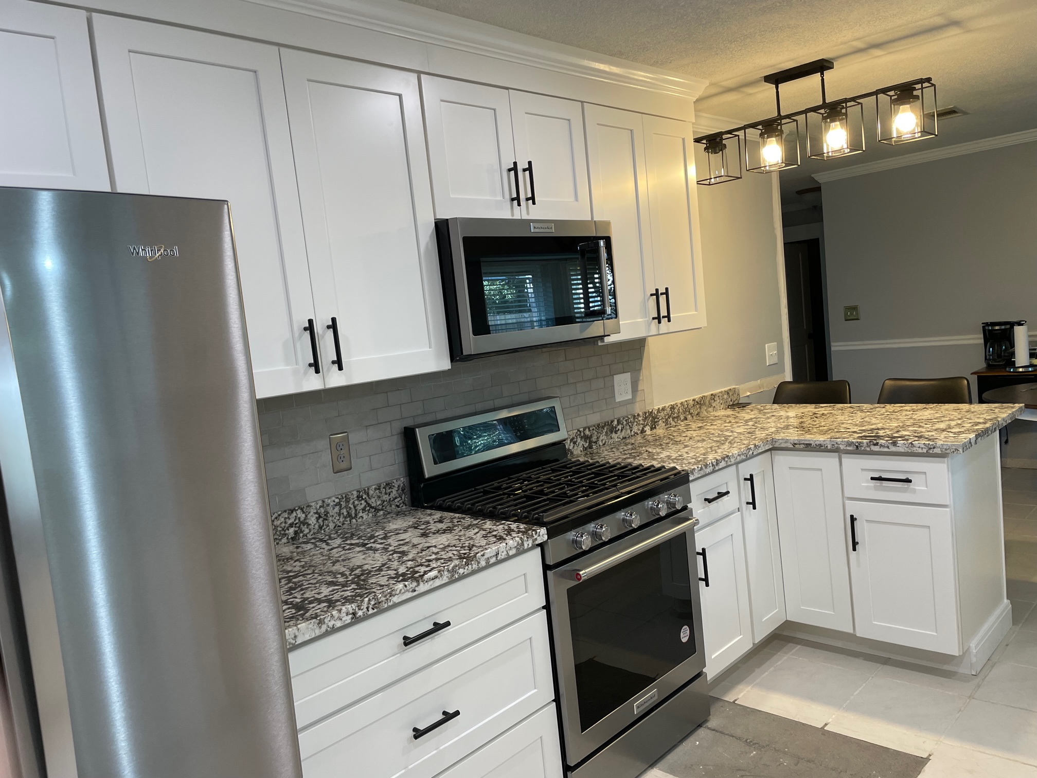 Kitchen Tune-up, Pensacola just finished this new kitchen cabinet renovation in Pensacola, Florida.