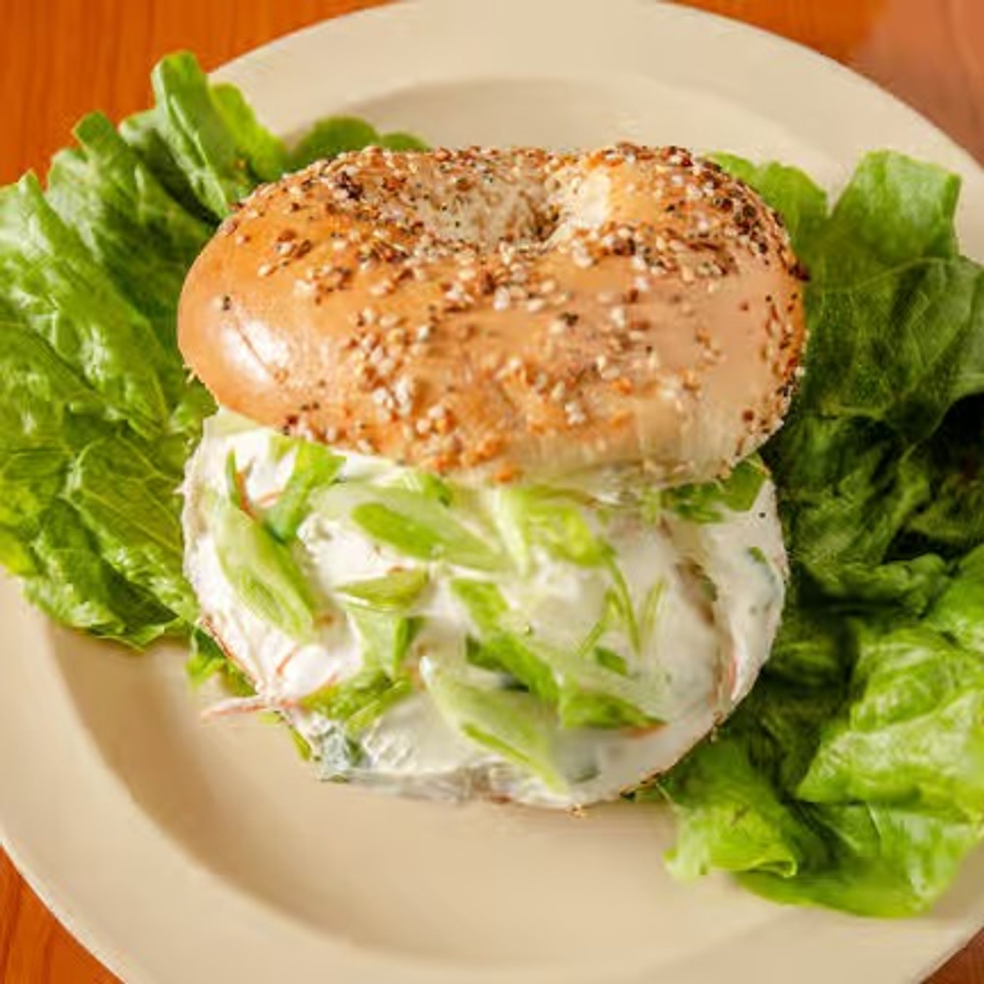 A bagel with low fat vegetable cream cheese