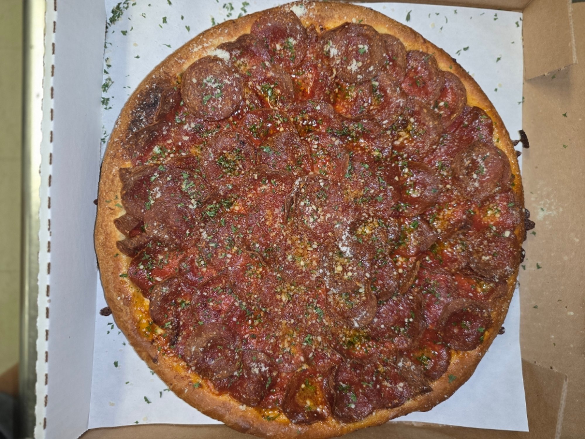 New York City thin crust, pizza sauce, overlapping pepperoni, parmesan & oregano