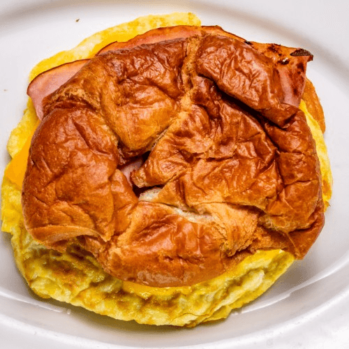 Croissant with Scrambled Egg, American Cheese, Bacon & Ham