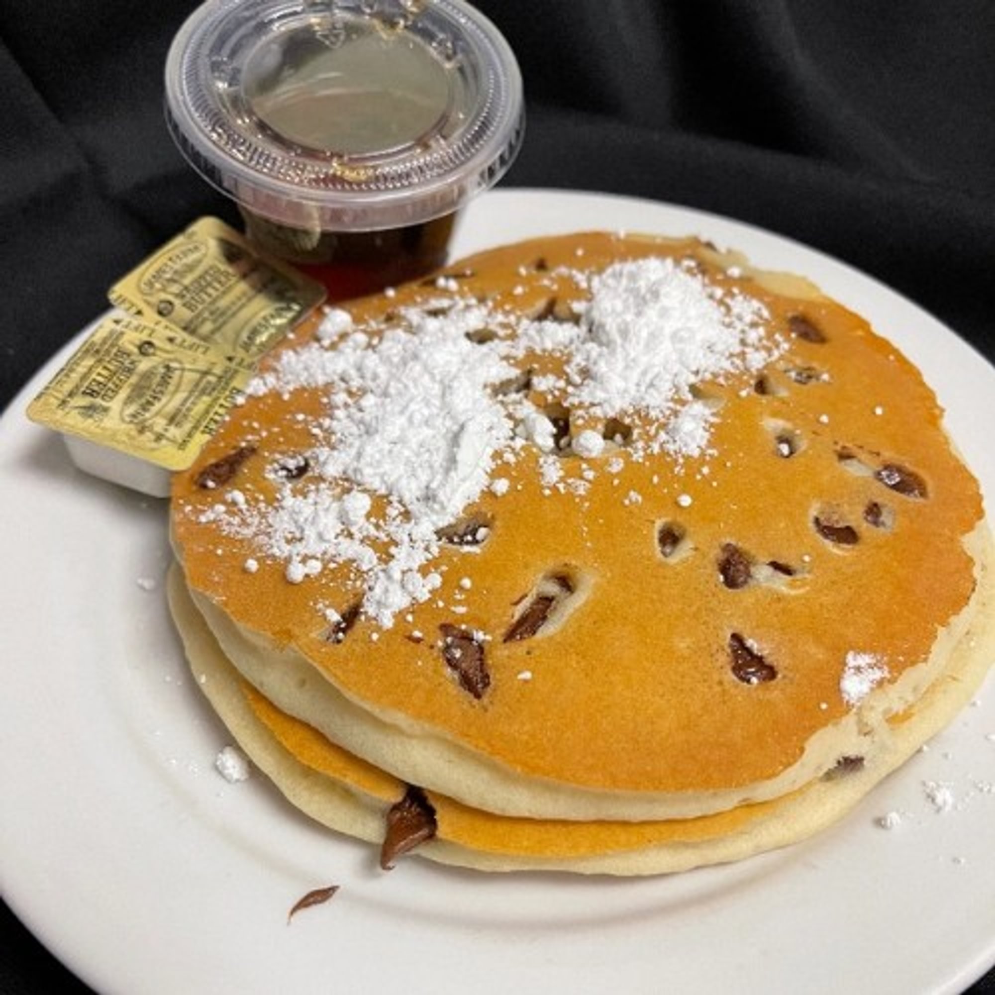 3 Chocolate Chips Pancakes Dusted with Powdered Sugar
