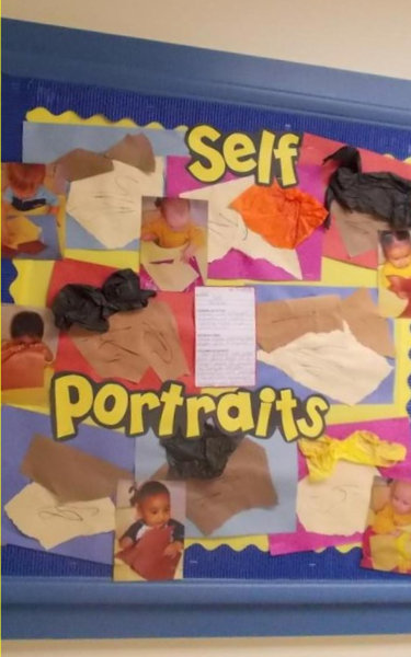 Our Infant class used their hands to crinkle paper to make these self portaits.