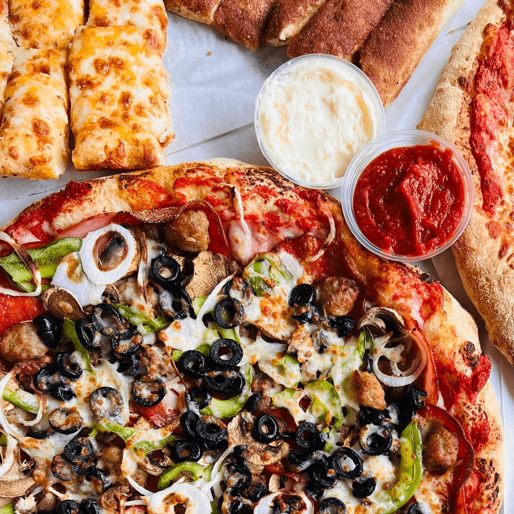 55.99 Medium Specialty Pizza, Large-2 Topping Pizza, Bread and 2 Liter Soda