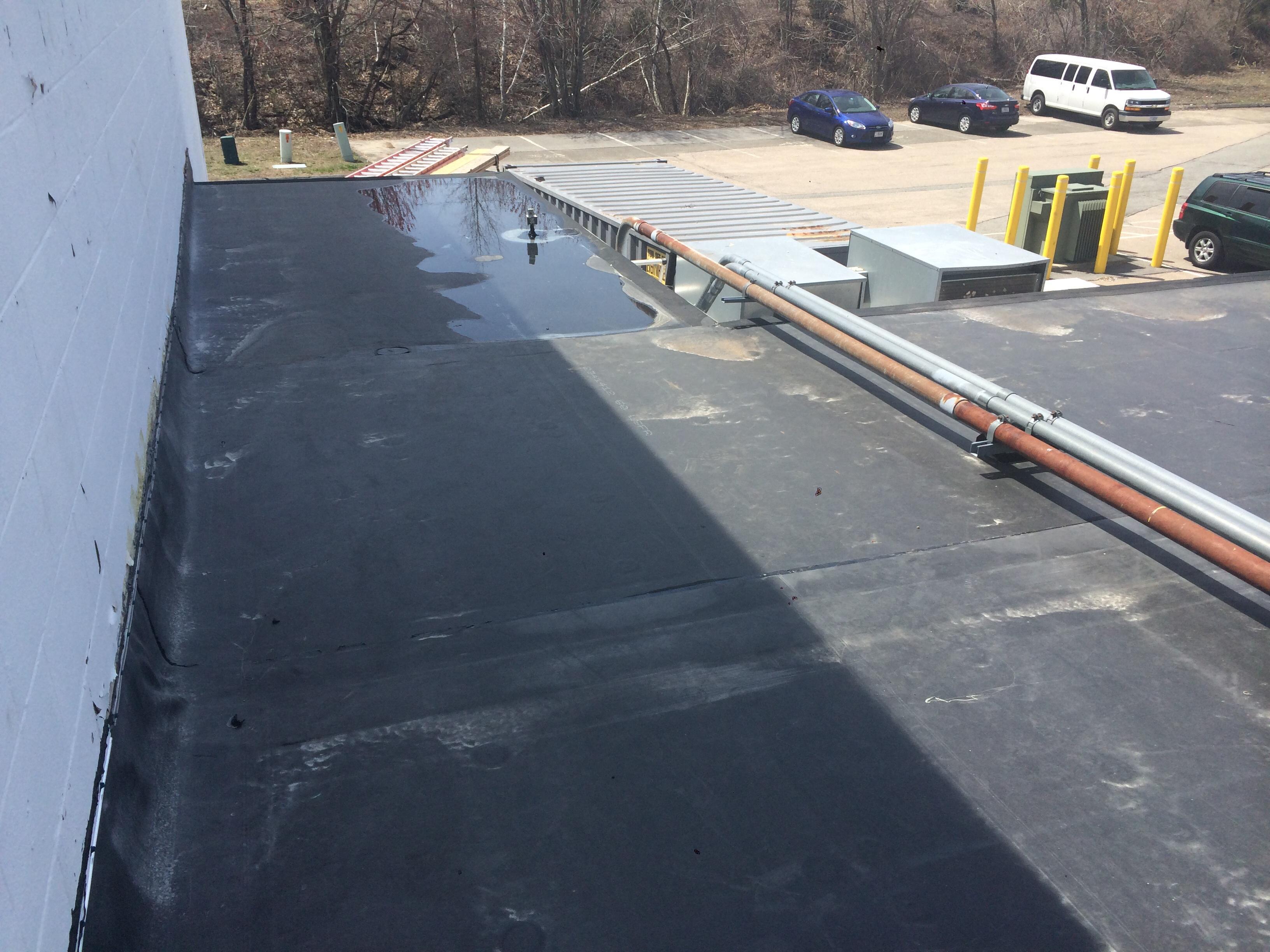 Strip and new EPDM install