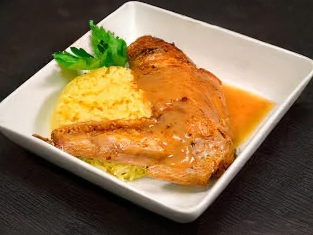 Baked Turkey Wing over rice w/ gravy (No sides)