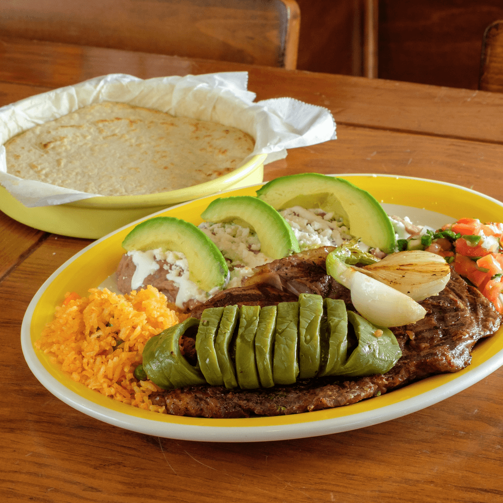 Bistec con Enfrijoladas (Ribeye Steak with Enfrijo)