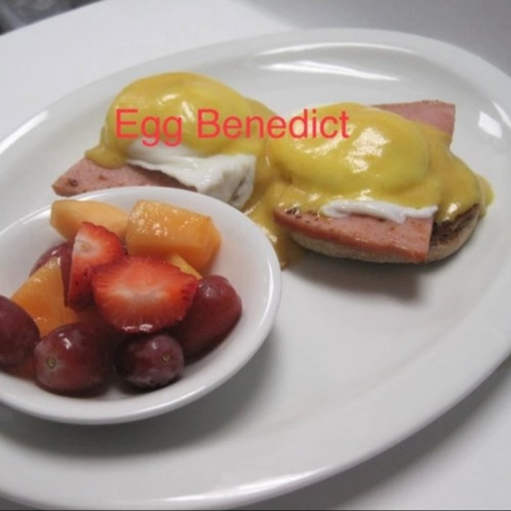Ham Benedict with fruit cup