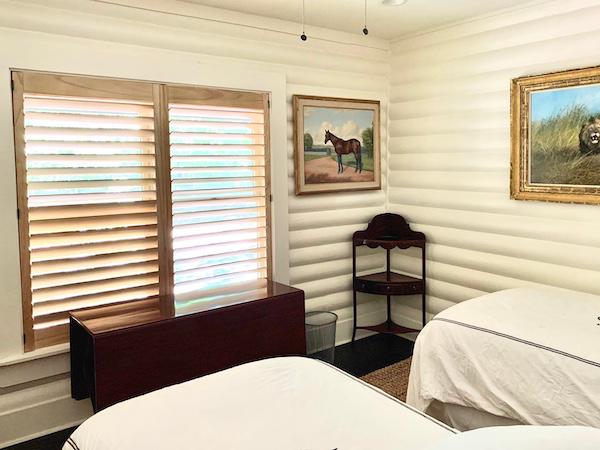 We absolutely love how these classic wood shutters add a rustic twist to this chic western bedroom! Plus, shutters are cordless and easy to clean- perfect for homes with children and pets. We are proud to serve Hilton Head Island and the surrounding area- schedule your FREE in-home consultation with