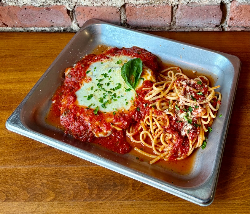 Chicken Parmigiana over Imported Linguine