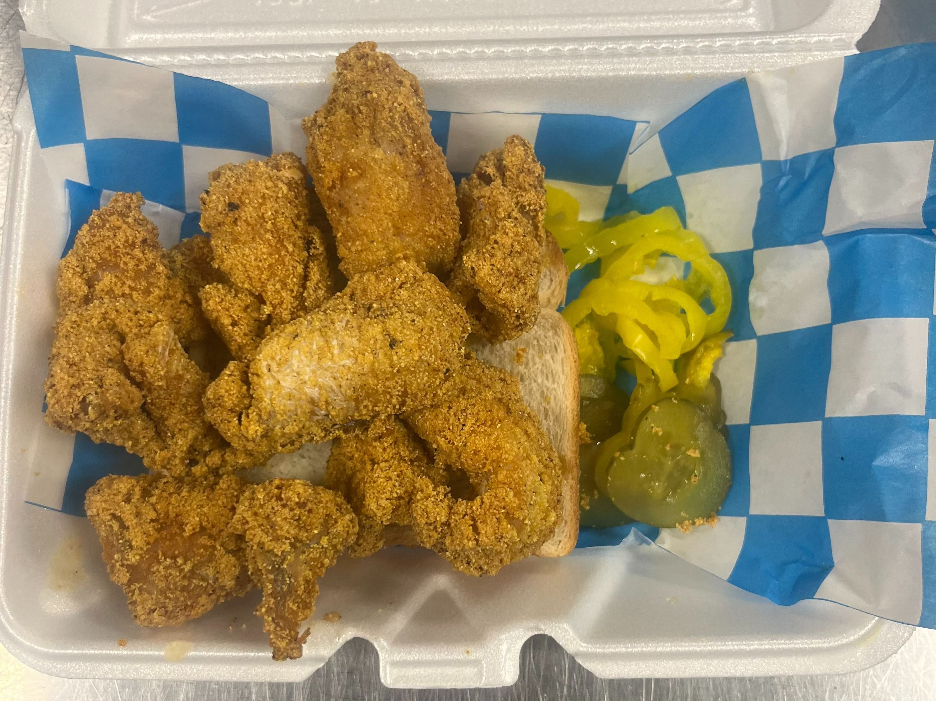 1/2 Lb Catfish Nuggets Sandwich with Pickles and Banana Peppers