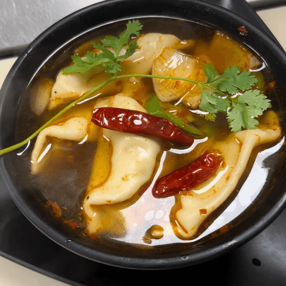 A16. Spicy Dumplings Soup