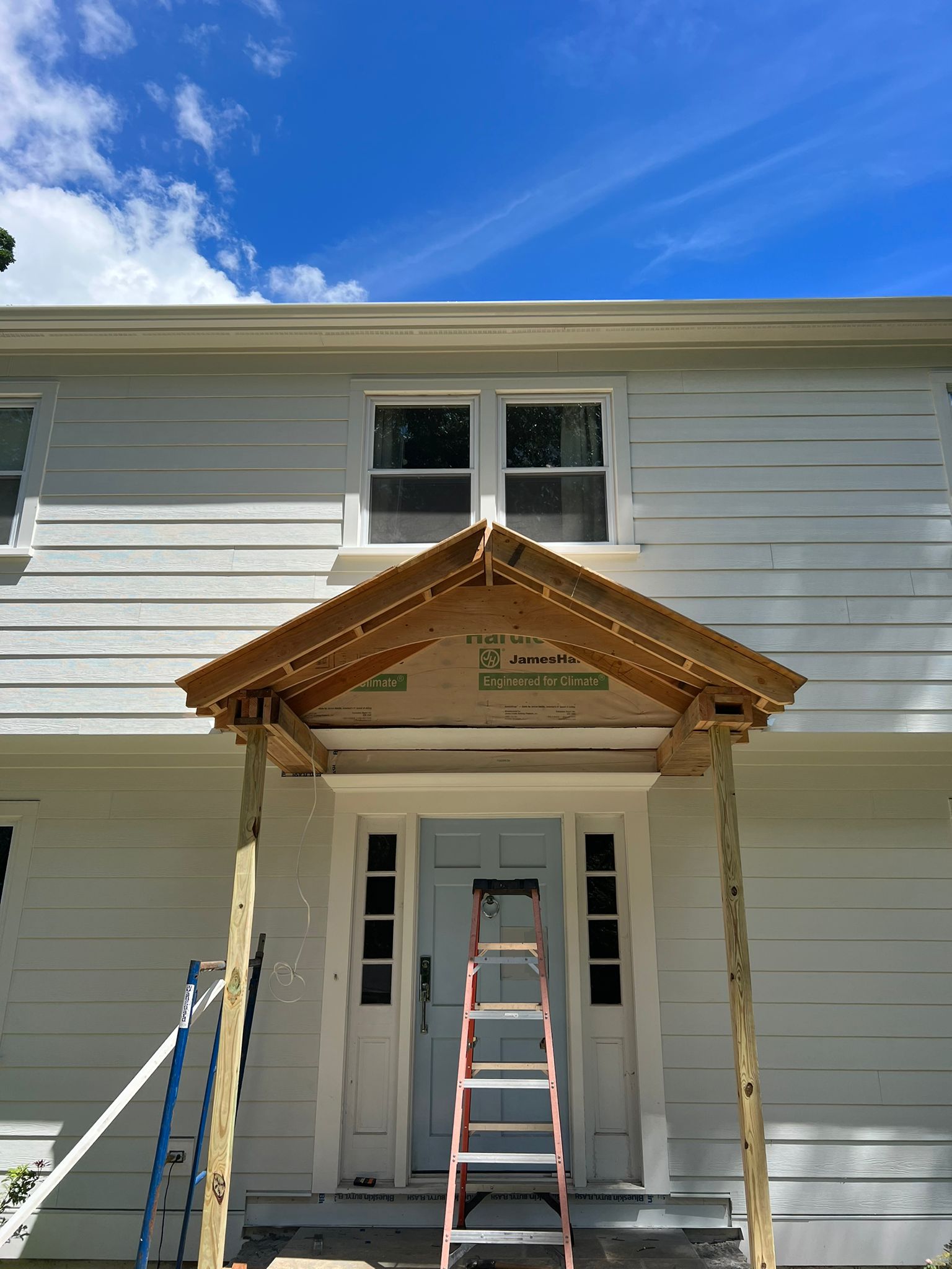 In progress Custom New Gable portico ortico in Westport with James Hardie Arctic White &