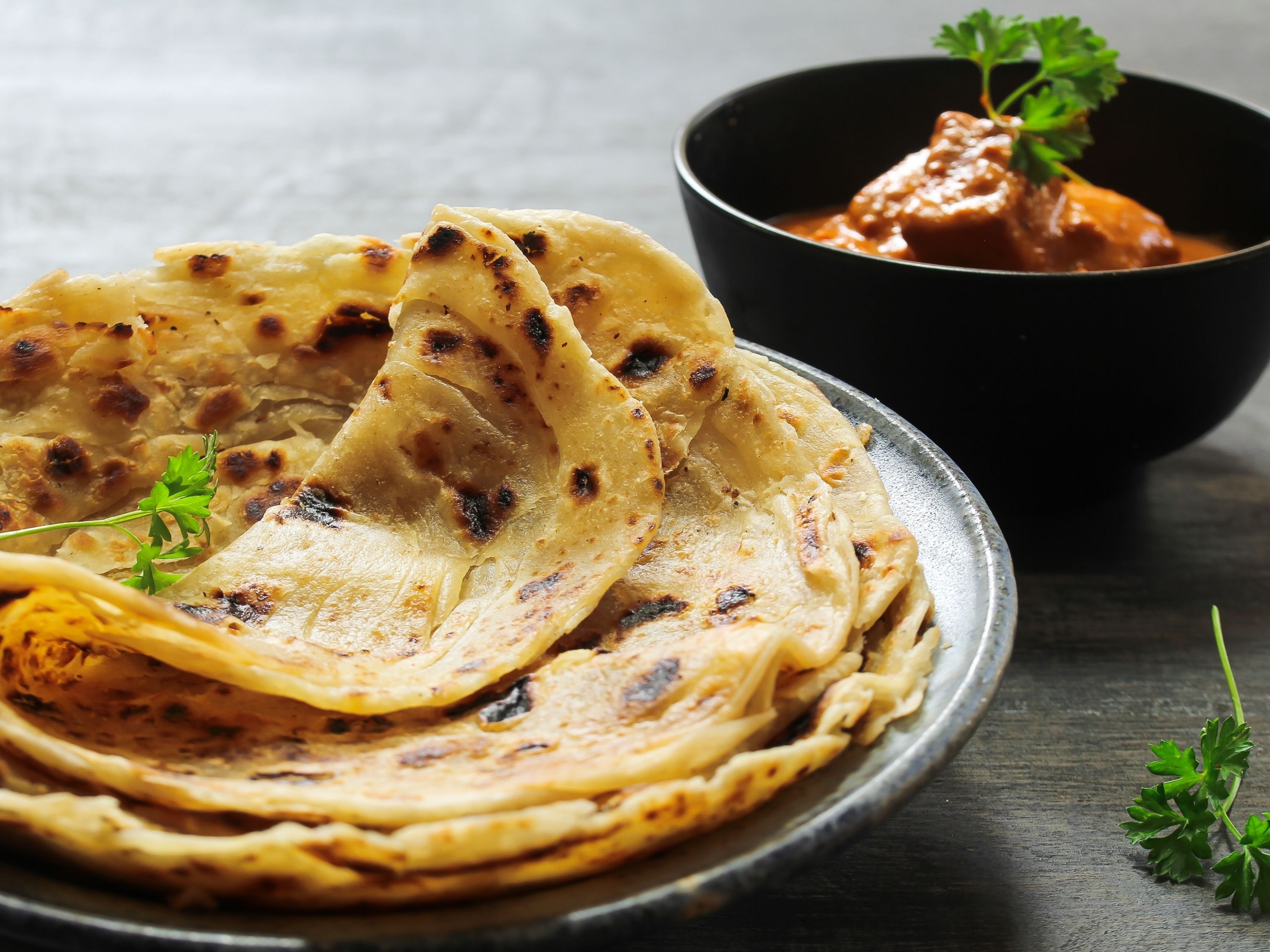 Malabar Paratha with Goat Bone Salan