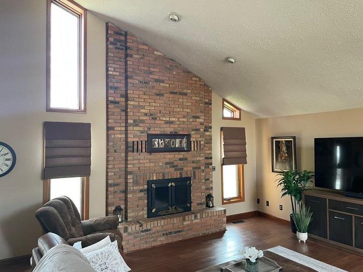 This living room from Plainfield is so cozy! And it's made even cozier by our Roman Shades, which are a great chocolate shade that helps pull the color palette together!  BudgetBlindsPlainfieldIN  PlainfieldIN  RomanShades  FreeConsultation  WindowWednesday