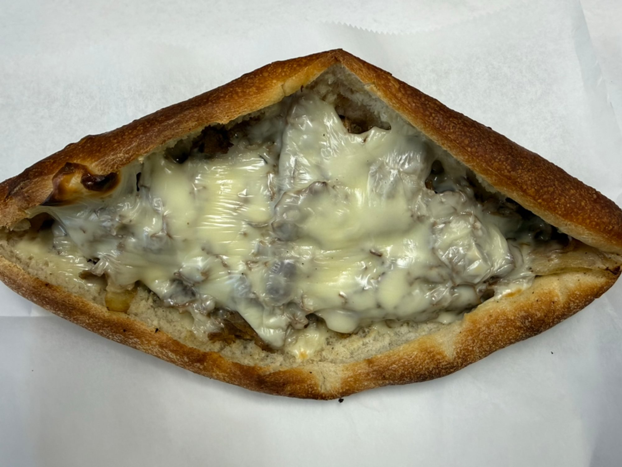 Chicken or Cheesesteak Pizzaiola Sandwich