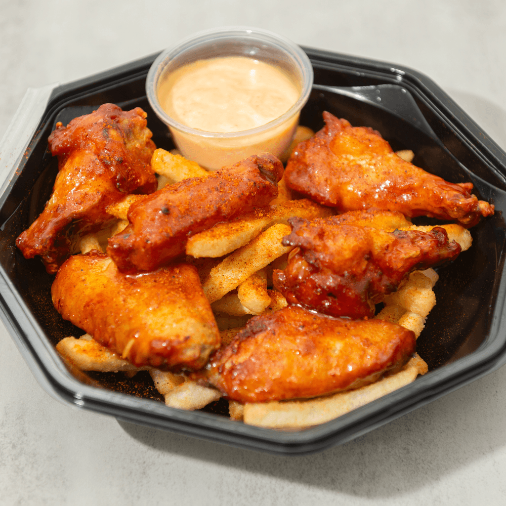 Buffalo Wings Over Seasoned Crispy Fries
